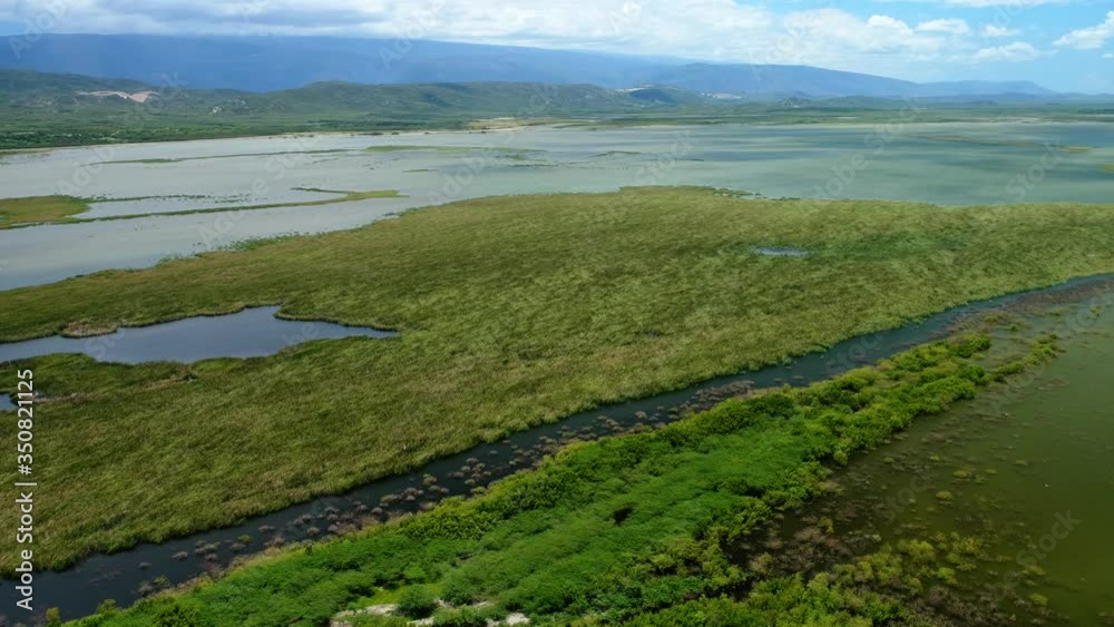 Drone view of Lagoon Cabral in Dominican republic. Aerial circling Drone view of Lagoon Cabral in Dominican republic. Aerial circling