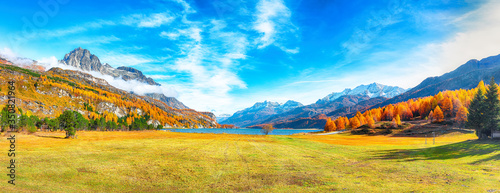 Charming autumn scene in Swiss Alps and views of Sils Lake (Silsersee).