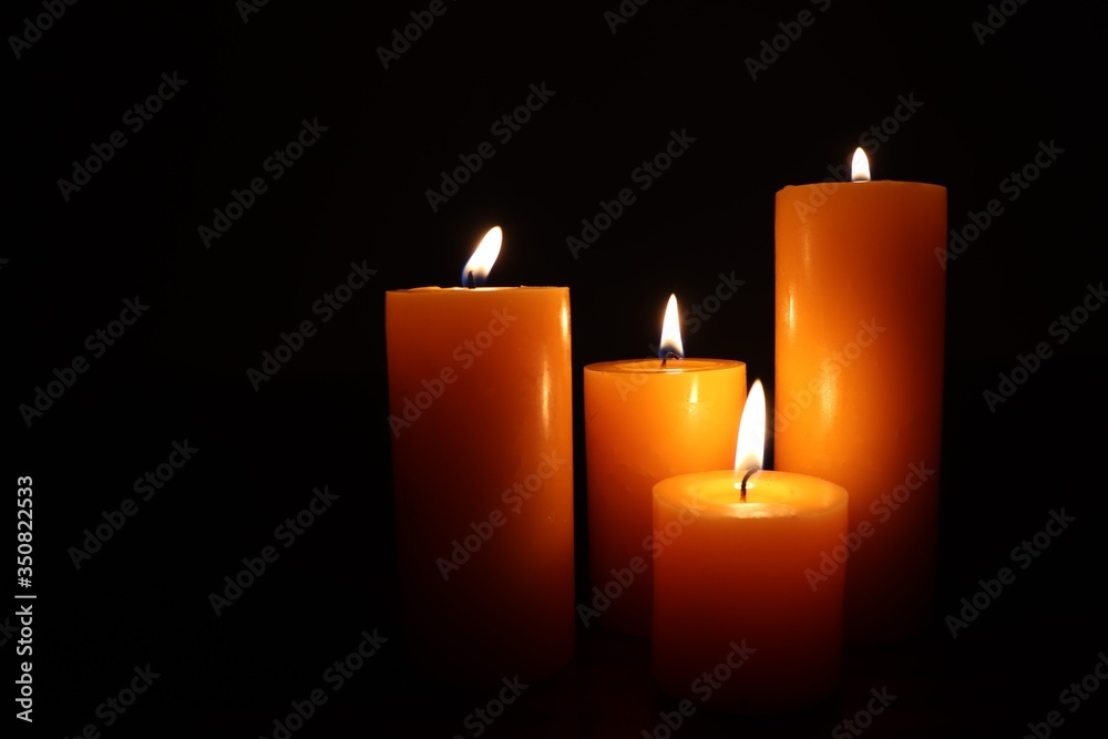 Candle black background of mourning funeral moment of silence Candle black background of mourning funeral moment of silence