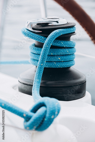 Sailboat winch and rope yacht detail. Yachting, Greece sea © Andrii