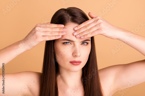 What... Pimple. Again. Close up photo of sad upset woman look in mirror find acne need dermatology skincare healthcare procedure to make skin perfect flawless pure isolated beige color background