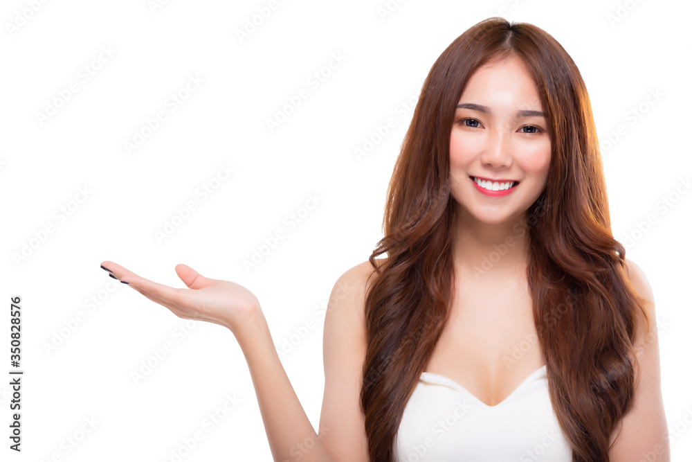 Beauty spa young Asian woman with beauty skin portrait. Beautiful girl showing empty copy space on open hand palm for text, product Proposing good product. Gesturing for advertisement white background Beauty spa young Asian woman with beauty skin portrait. Beautiful girl showing empty copy space on open hand palm for text, product Proposing good product. Gesturing for advertisement white background