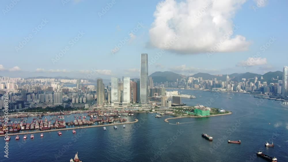 Aerial view of Hong Kong West Kowloon Bay Area and skyscrapers on a beautiful clear day. Aerial view of Hong Kong West Kowloon Bay Area and skyscrapers on a beautiful clear day.