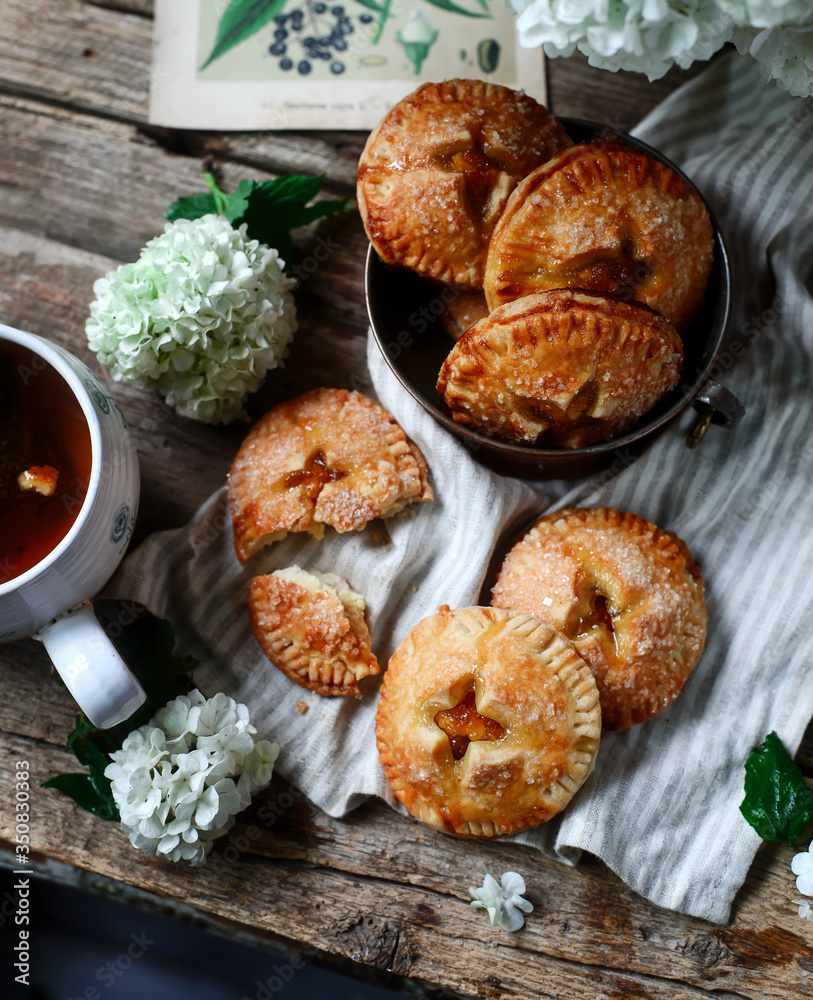 Jam filled hand pies. .Dark rustic photo Jam filled hand pies. .Dark rustic photo