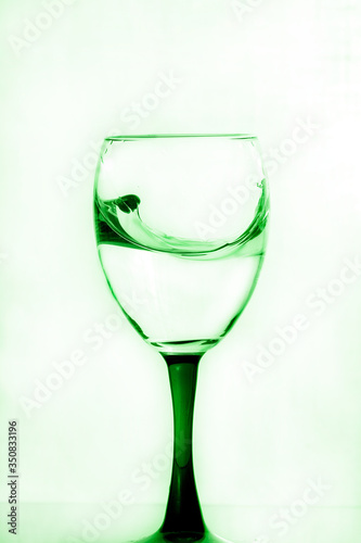 Splashes of water in a glass glass