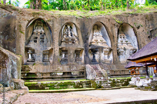Fototapeta Naklejka Na Ścianę i Meble -  Pura Gunung Kawi Temple in Ubud, Bali Island, Indonesia. Ancient carved in the stone temple with royal tombs.