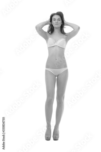 young girl with slender body posing in underwear