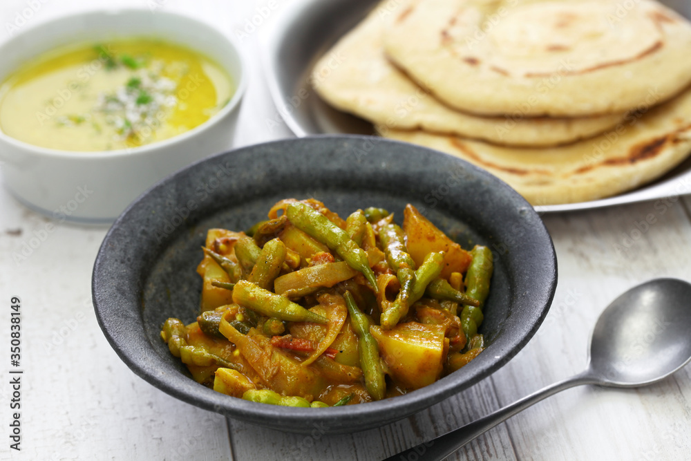 Sengri aloo ki sabzi, simmered radish pods & potatoes with spices, indian cuisine