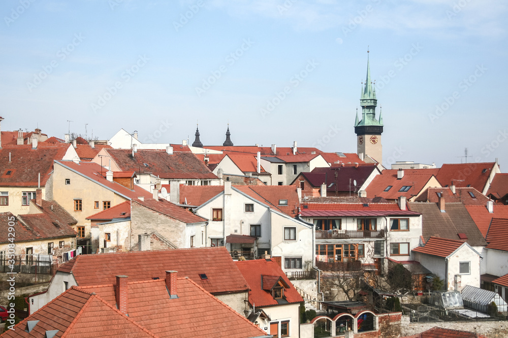 Panorama of Znojmo old town in Czech Republic, & its town hall tower, or znojemska radnicni vez & old medieval buildings with the Thaya river in background. It is a landmark of Southern Moravia