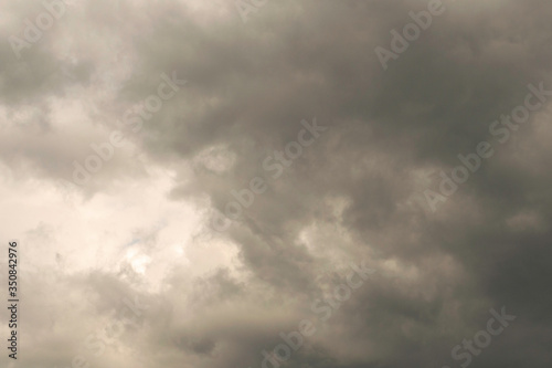 rain clouds in a blue sky for backdrop background