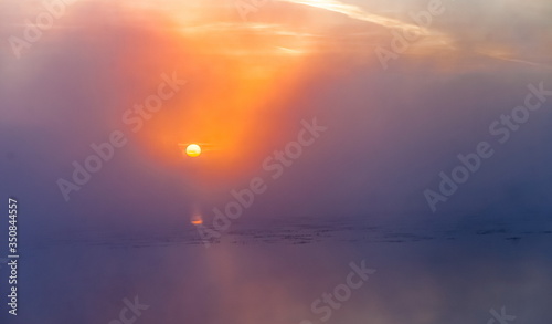 Mist over the lake dawn early morning in the summer