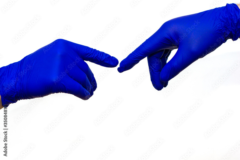 hands in blue protective medical gloves touch each other with fingers on the white background hands in blue protective medical gloves touch each other with fingers on the white background