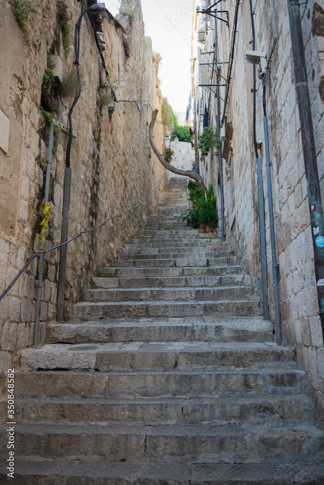 Steep stairs and narrow street in old town of Dubrovnik, Croatia