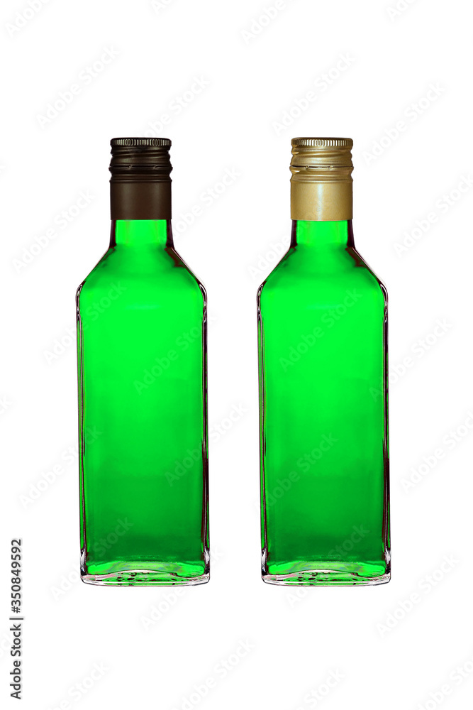 Two bottles with green liquor wih black and golden caps isolated on white Two bottles with green liquor wih black and golden caps isolated on white