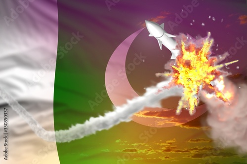 Pakistan intercepted ballistic missile, modern antirocket destroys enemy missile concept, military industrial 3D illustration with flag photo