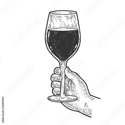 huge glass with wine in hand sketch engraving vector illustration. T-shirt apparel print design. Scratch board imitation. Black and white hand drawn image.