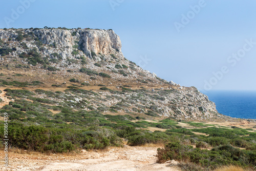 Descent to the sea along a mountain trail with a beautiful view. Peaceful landscape