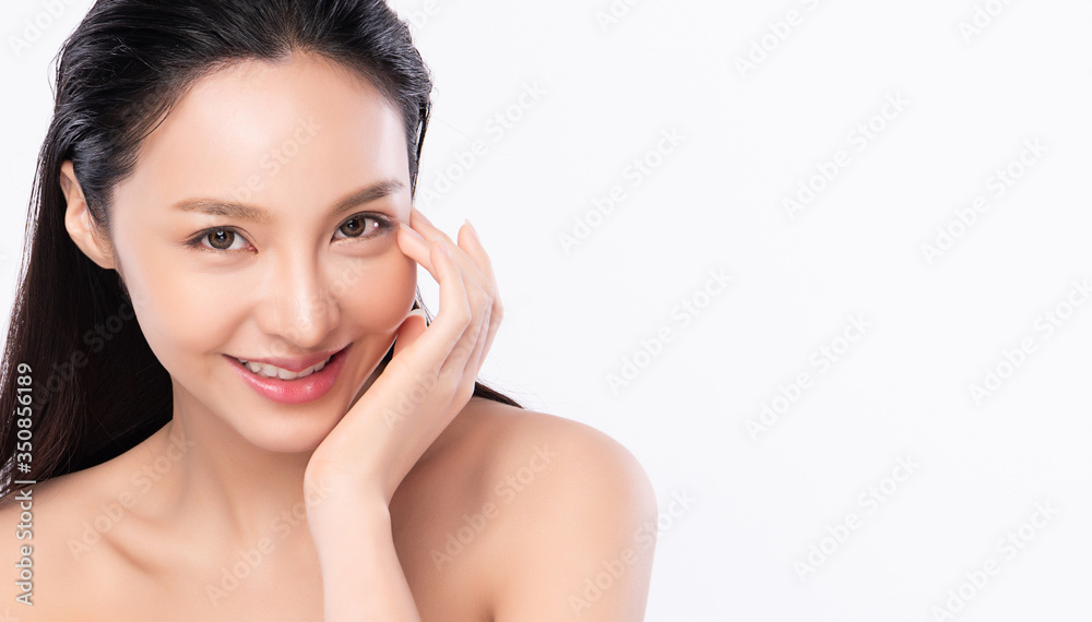 Fototapeta premium Beautiful Young Asian Woman touching her clean face with fresh Healthy Skin, isolated on white background, Beauty Cosmetics and Facial treatment Concept