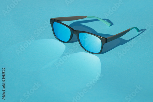 glasses on blue background