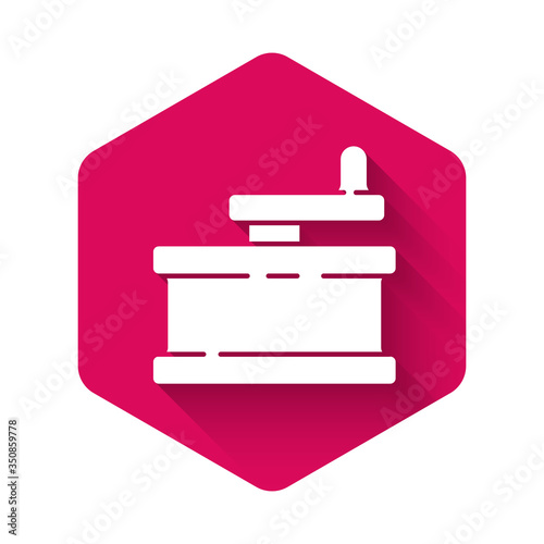 White Manual grinder icon isolated with long shadow. Pink hexagon button. Vector