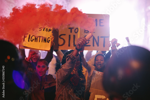 Photography Group of people protesting with smoke grenades