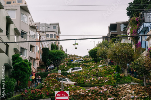 People walk on the Lombard street in San Francisco.