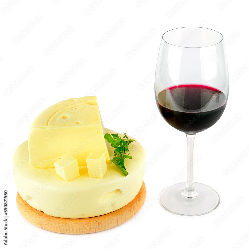 Red wine glass and cheese. Isolated on white . Red wine glass and cheese. Isolated on white .