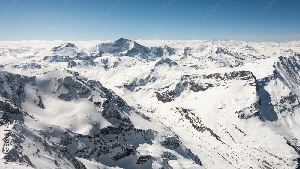 snowy mountains in Alps de Savoie snowy mountains in Alps de Savoie
