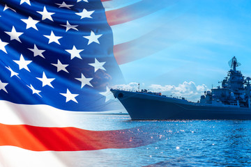 A ship on a Sunny day against the background of the us flag. An American warship with guns and radars. American fleet. Naval forces of the United States. Armies of the world's countries.