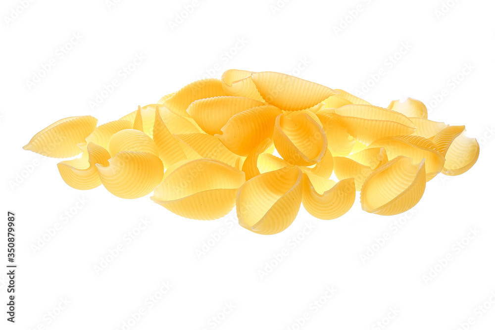 Conchiglie rigate pasta or seashell macaroni isolated on white background. Italian cuisine, healthy food with carbohydrates, diet, nutrition concept. Conchiglie rigate pasta or seashell macaroni isolated on white background. Italian cuisine, healthy food with carbohydrates, diet, nutrition concept.