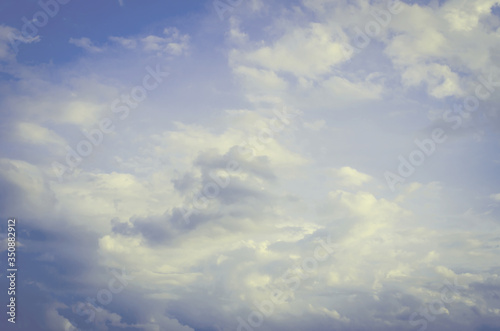 Sunset in the clouds in the form of tracks Sunset light Clouds in the form of long orange stripes in the sky

