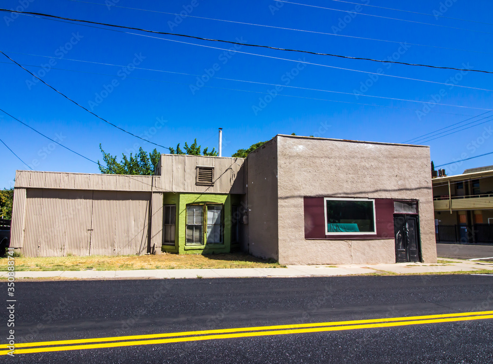 Old One Level Corner Building In Disrepair Old One Level Corner Building In Disrepair