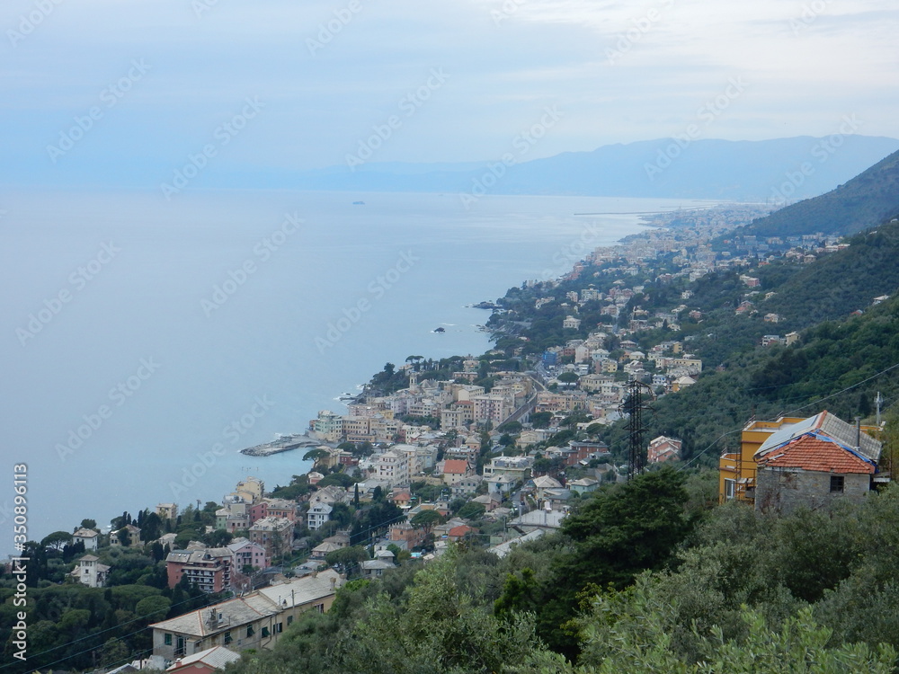 ligurian coastiline east of Genoa with the village of Bogliasco in the foreground on a cloudy day, Liguria, Italy