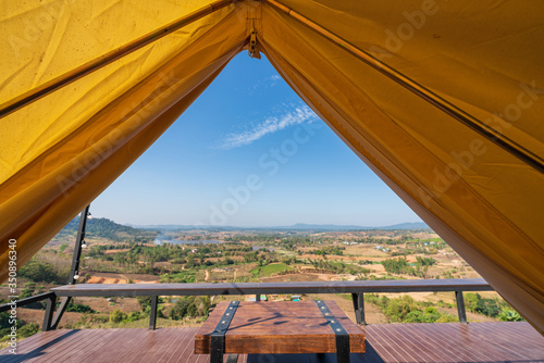 after Coronavirus Covid 19 long Quarantine want to go out see wild nature camping with beautiful blue sky mountain views sitting see sunset with lover at Thailand, relax before come back to work 