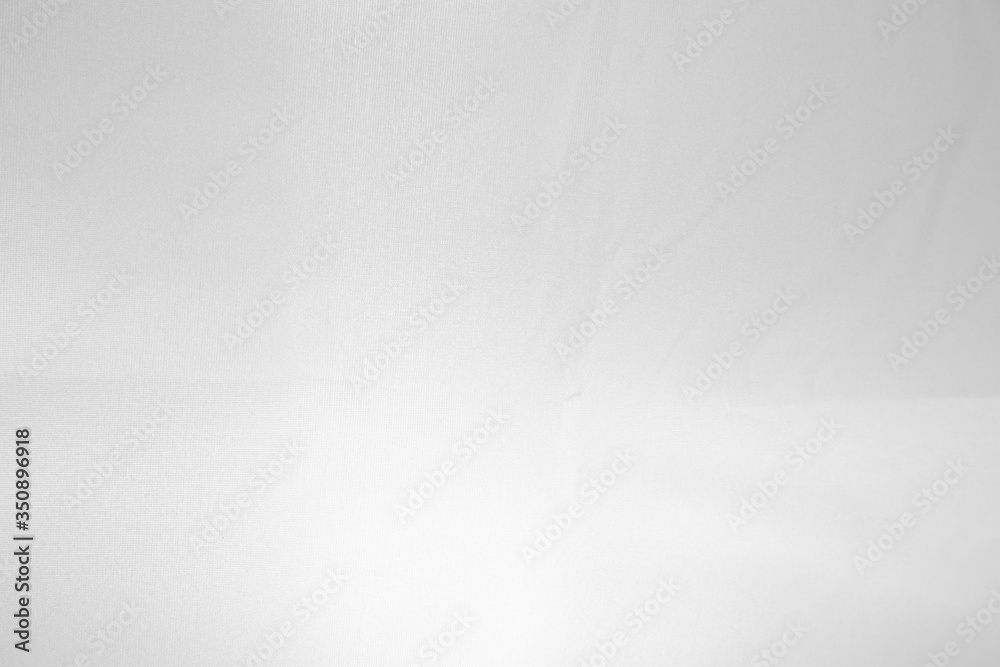 White fabric textile material texture background.. White fabric textile material texture background..