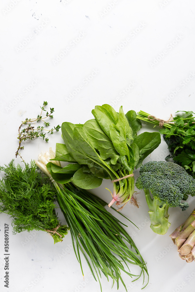 Bunches of fresh green herbs and veggies Bunches of fresh green herbs and veggies
