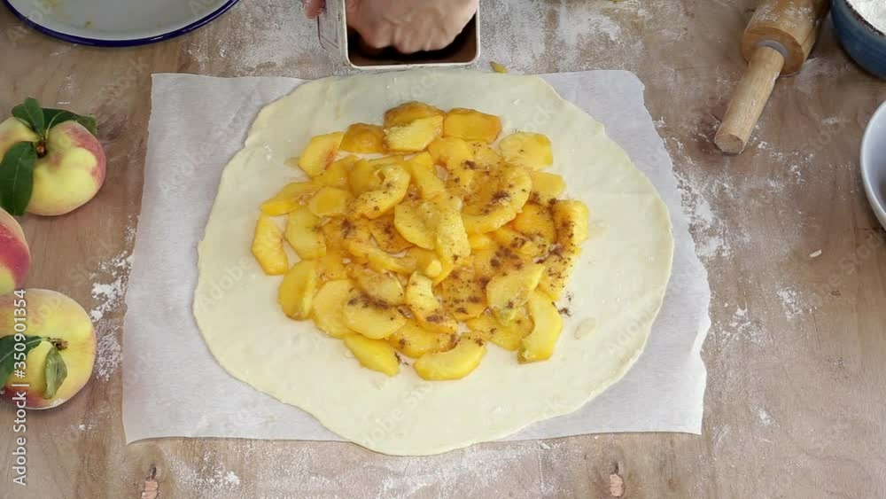 Homemade tart galette with peaches and almonds Homemade tart galette with peaches and almonds