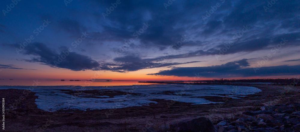 Fototapeta premium sunset over the sea, by the arctic summer nights. Oulu, Finland