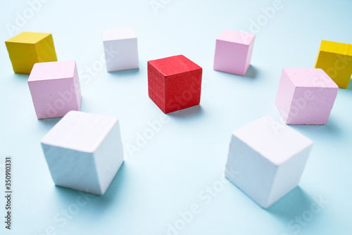 Wooden cubes blue background, business concept © Sergey