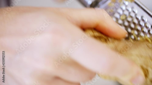 Wallpaper Mural Home cook grating a fresh ginger root. Natural foods and wellbeing. Close up, shot in Pro Res Torontodigital.ca