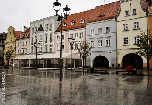 Old town square in Europe on rainy weather