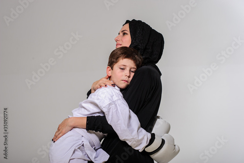 Portrait of motherand her chempion boxer son. photo