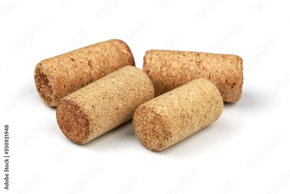 Set from the collection of four different vintage wine corks isolated on a white background