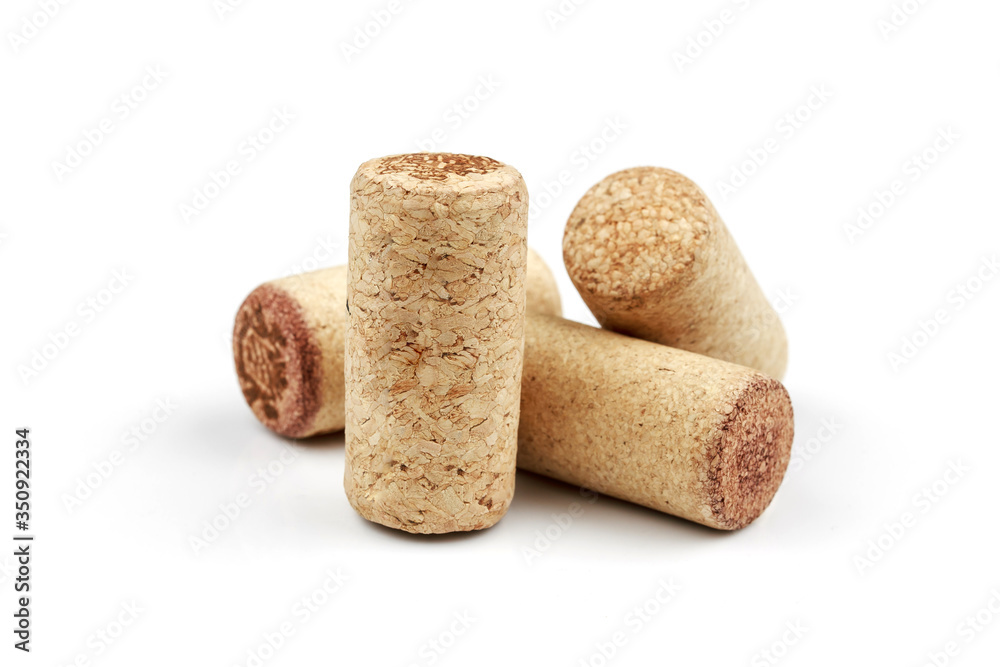Set from the collection of four different vintage wine corks isolated on a white background