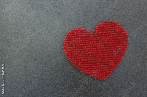 Fresh and clear red clothes heart on the floor