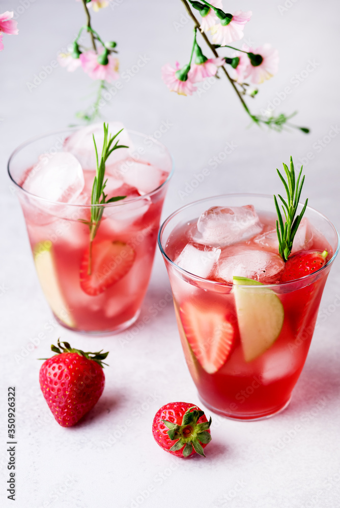 Glasses of Fresh and Cold Strawbery and Green Apple Lemonade Tasty and Healthy Summer Drink Cold Berry and Fruit Lemonade Vertical Glasses of Fresh and Cold Strawbery and Green Apple Lemonade Tasty and Healthy Summer Drink Cold Berry and Fruit Lemonade Vertical