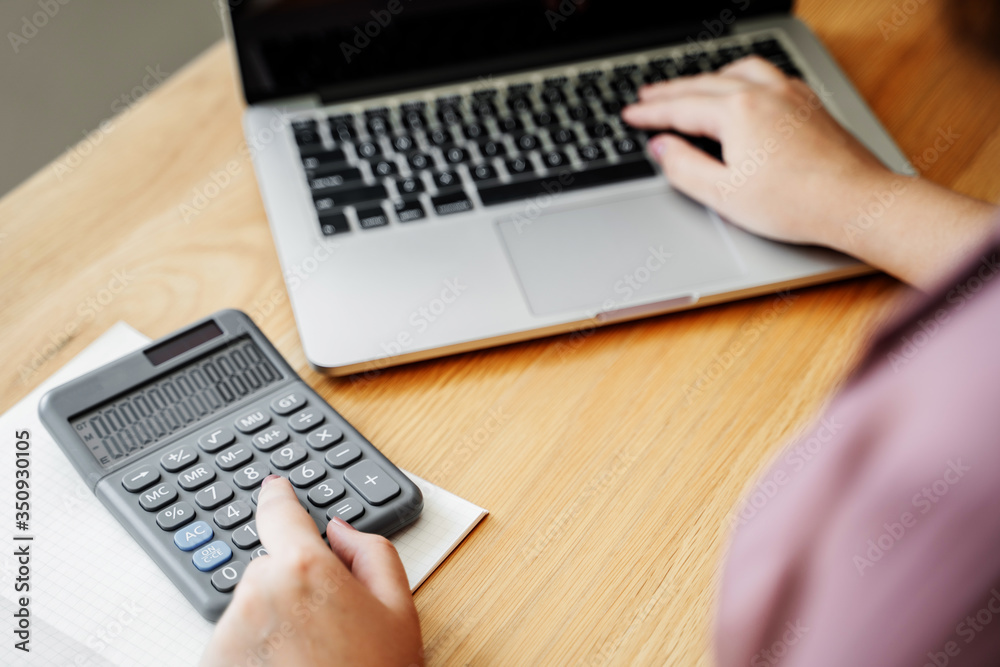Business sales consultant working in data documents at modern office. Business sales consultant working in data documents at modern office.