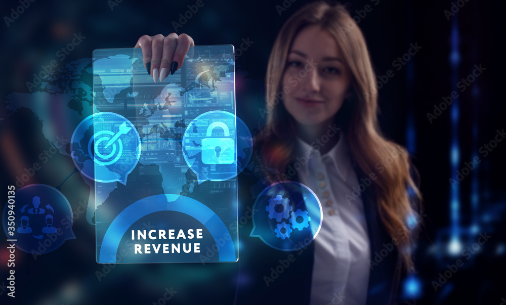 Business, Technology, Internet and network concept. Young businessman working on a virtual screen of the future and sees the inscription: Increase revenue Business, Technology, Internet and network concept. Young businessman working on a virtual screen of the future and sees the inscription: Increase revenue