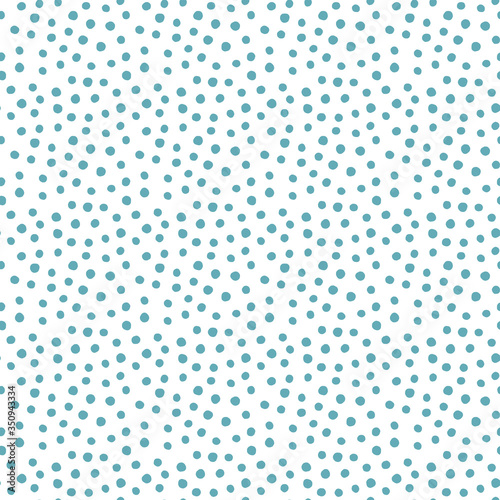 Ditsy vector polka dot pattern with scattered hand drawn small circles in blue. Seamless texture on white background. Modern hipster background with confetti.