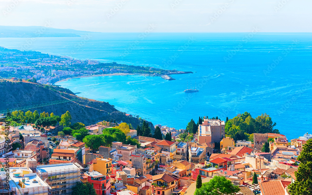 Cityscape of Taormina and Mediterranean Sea Sicily reflex